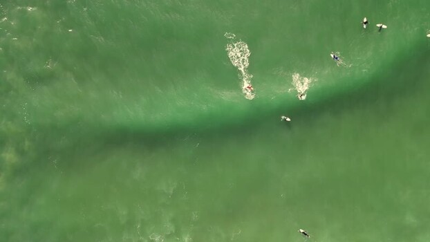 Aerial view of surfers at Praia da Mata Portugal. Aerial view of surfers at Praia da Mata Portugal.