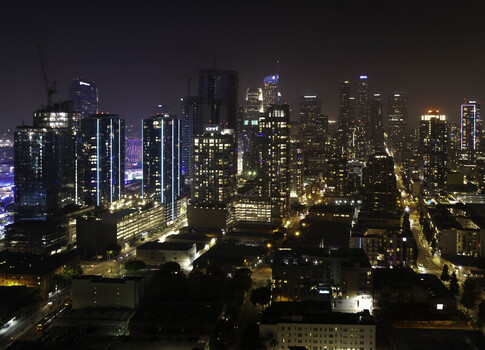 Los Angeles CA United States 19 November 2021 Aerial view of Downtown Los Angeles at night with illuminated skyscrapers glowing streets and dense urban architecture. Los Angeles CA United States 19 November 2021 Aerial view of Downtown Los Angeles at night with illuminated skyscrapers glowing streets and dense urban architecture.