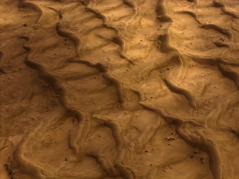 Aerial view of desert sand dunes with intricate wavy patterns and golden light in Senek Mangystau Region Kazakhstan.