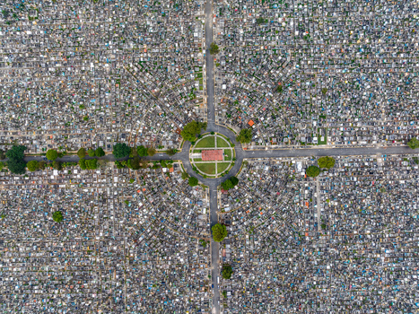 Aerial view of Maximo Gomez National Cemetery featuring a dense grid of graves and a central circular plaza with trees in Santo Domingo Distrito Nacional Dominican Republic. Aerial view of Maximo Gomez National Cemetery featuring a dense grid of graves and a central circular plaza with trees in Santo Domingo Distrito Nacional Dominican Republic.