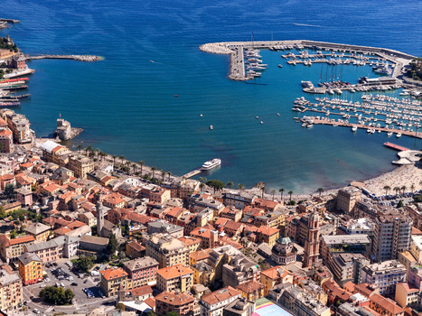 Aerial view of the harbor and colorful historic buildings along the coastline in Rapallo Liguria Italy. Aerial view of the harbor and colorful historic buildings along the coastline in Rapallo Liguria Italy.