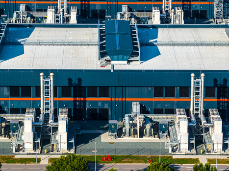 Aerial view of the Agriport a7 industrial facility with modern architecture large HVAC cooling units and complex piping systems Middenmeer Noord Holland Netherlands. Aerial view of the Agriport a7 industrial facility with modern architecture large HVAC cooling units and complex piping systems Middenmeer Noord Holland Netherlands.