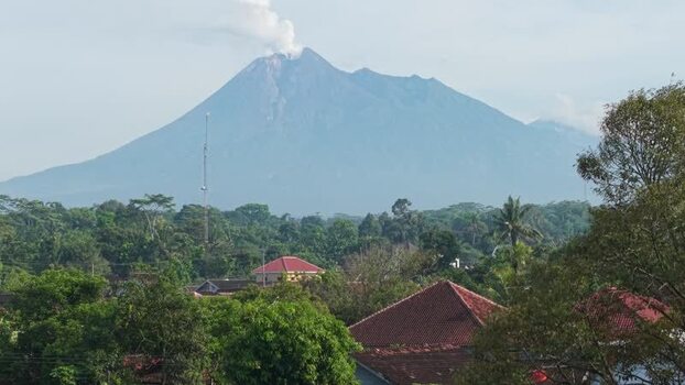 Aerial view of Mount Merapi volcano and village Indonesia.