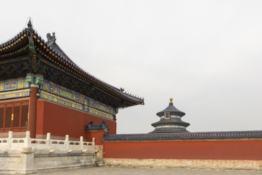 View of the Temple of Heaven showing the Hall of Prayer for Good Harvests and traditional red walls Beijing Beijing China. View of the Temple of Heaven showing the Hall of Prayer for Good Harvests and traditional red walls Beijing Beijing China.