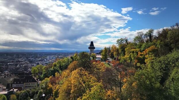 Aerial view of Schlossberg hill and Uhrturm clock tower Austria.