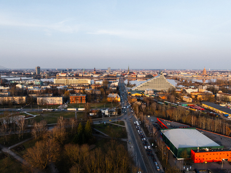 Aerial view of the National Library of Latvia and the historic skyline of Old Riga seen from Uzvaras bulvaris during sunset in Riga Latvia. Aerial view of the National Library of Latvia and the historic skyline of Old Riga seen from Uzvaras bulvaris during sunset in Riga Latvia.