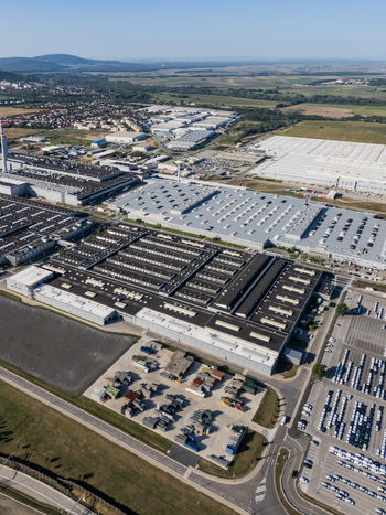 Aerial view of the Volkswagen plant near Devinska Nova Ves featuring large industrial halls and parking lots filled with new cars in Bratislava Bratislavsky kraj Slovakia. Aerial view of the Volkswagen plant near Devinska Nova Ves featuring large industrial halls and parking lots filled with new cars in Bratislava Bratislavsky kraj Slovakia.