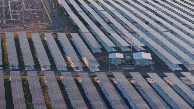 Aerial view of PLTS Bali Timur solar farm in Kubu Indonesia. Aerial view of PLTS Bali Timur solar farm in Kubu Indonesia.