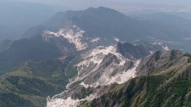 Aerial view of Carrara marble quarries in the Apuan Alps Italy. Aerial view of Carrara marble quarries in the Apuan Alps Italy.