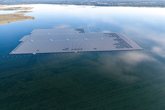 Aerial view of the floating solar farm on Cottbuser Ostsee a former open pit mine showing repair works on the solar panels in Cottbus Brandenburg Germany. Aerial view of the floating solar farm on Cottbuser Ostsee a former open pit mine showing repair works on the solar panels in Cottbus Brandenburg Germany.