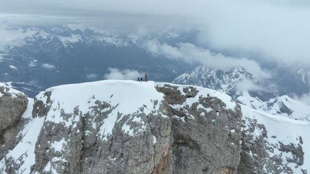 Aerial view of snowy peaks in Parco Naturale Paneveggio Italy