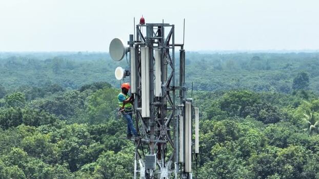 Aerial view of a technician on a telecom tower Bangladesh.
