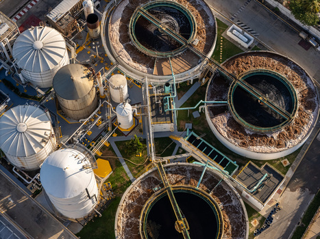 Aerial view of the beer industrial complex in Santo Domingo featuring large circular fermentation tanks storage silos and complex piping systems Santo Domingo Dominican Republic. Aerial view of the beer industrial complex in Santo Domingo featuring large circular fermentation tanks storage silos and complex piping systems Santo Domingo Dominican Republic.