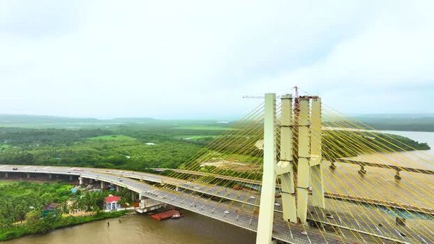 Aerial view of New Zuari Bridge over the river in India.