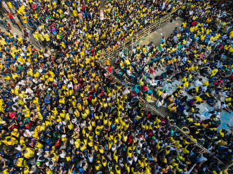 Dhaka Bangladesh 20 June 2026 Aerial view of a dense crowd of people wearing yellow shirts gathered at the Dhaka University Campus. Dhaka Bangladesh 20 June 2026 Aerial view of a dense crowd of people wearing yellow shirts gathered at the Dhaka University Campus.