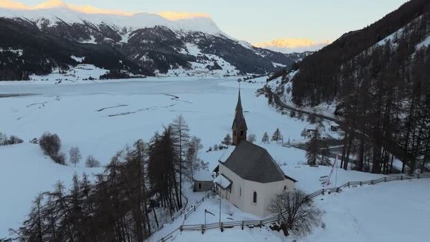 Aerial view of the church tower in Graun im Vinschgau Italy. Aerial view of the church tower in Graun im Vinschgau Italy.