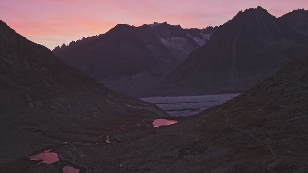 Aerial view of Aletsch Glacier at sunset Switzerland.