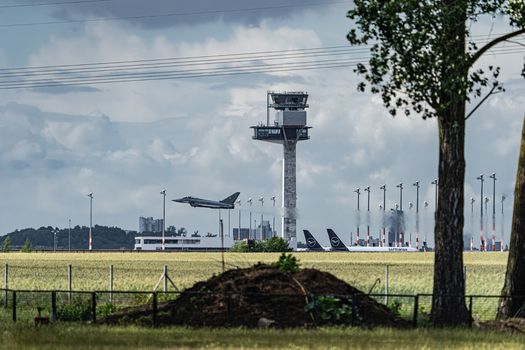 Berlin Berlin Germany 13 June 2026 View of a Eurofighter Typhoon taking off at ILA Berlin Air Show with the control tower and parked aircraft in the background. Berlin Berlin Germany 13 June 2026 View of a Eurofighter Typhoon taking off at ILA Berlin Air Show with the control tower and parked aircraft in the background.