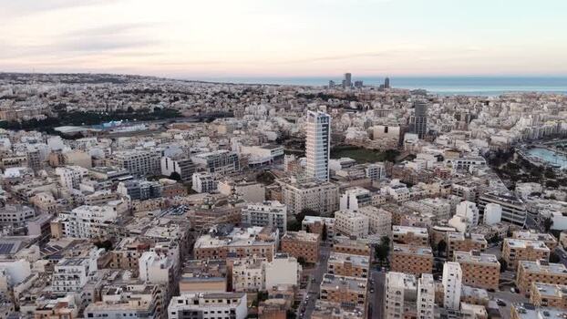 Aerial view of the urban skyline and modern buildings in Malta. Aerial view of the urban skyline and modern buildings in Malta.