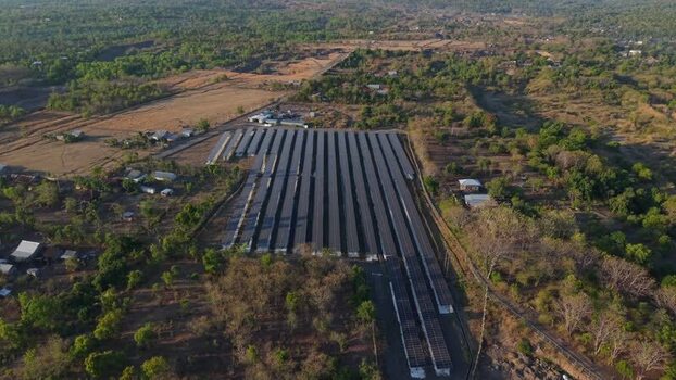 Aerial view of PLTS Bali Timur solar power plant in Indonesia. Aerial view of PLTS Bali Timur solar power plant in Indonesia.