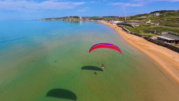 Aerial view of a paramotor flying over Kilyos beach Turkey. Aerial view of a paramotor flying over Kilyos beach Turkey.