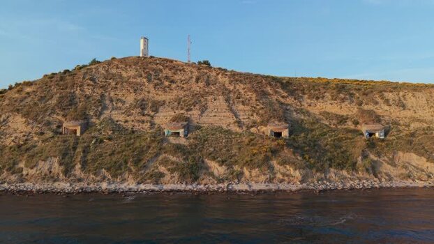 Aerial view of coastal bunkers and a lighthouse in Zvernec Albania. Aerial view of coastal bunkers and a lighthouse in Zvernec Albania.