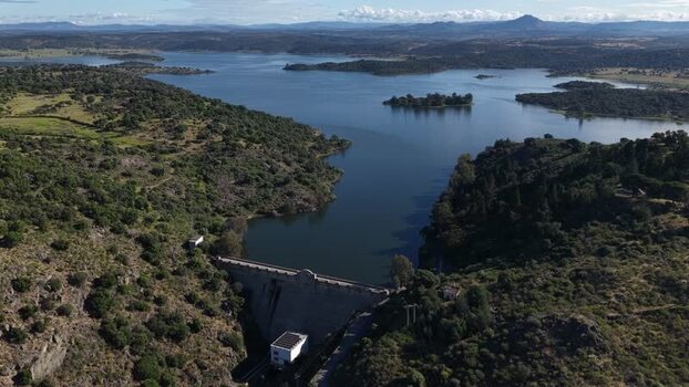 Aerial view of a large dam and reservoir Portugal.