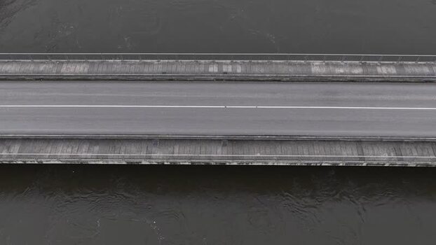 Aerial view of a car on a bridge Portugal.