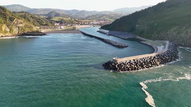 Aerial view of Antilla beach and breakwater in Spain.