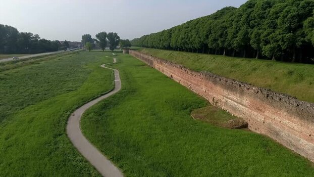 Aerial view of the ancient city walls and lush green trees Italy. Aerial view of the ancient city walls and lush green trees Italy.