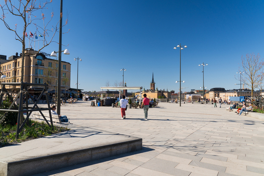 Stockholm Sweden 02 May 2026 View of Sodermalmstorg square with people walking and sitting under a clear blue sky with the city skyline in the background. Stockholm Sweden 02 May 2026 View of Sodermalmstorg square with people walking and sitting under a clear blue sky with the city skyline in the background.