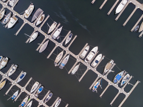 Aerial view of the marina with numerous boats docked at the pier in La Cruz de Huanacaxtle Nayarit Mexico. Aerial view of the marina with numerous boats docked at the pier in La Cruz de Huanacaxtle Nayarit Mexico.