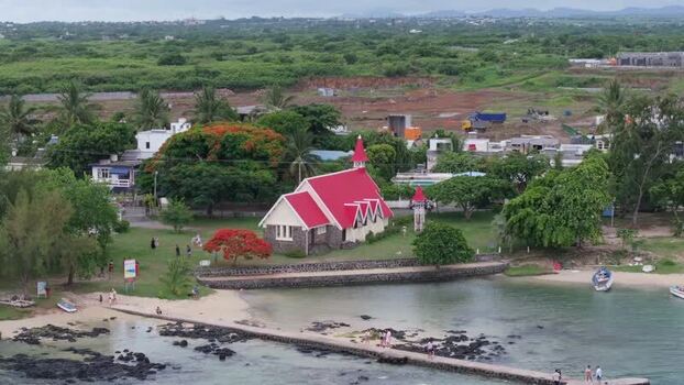 Aerial view of Cap Malheureux church with red roof Mauritius.