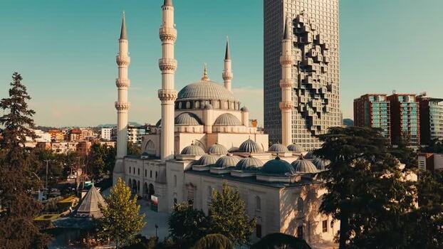 Aerial view of Mosque of Namazgah and modern skyline in Albania. Aerial view of Mosque of Namazgah and modern skyline in Albania.