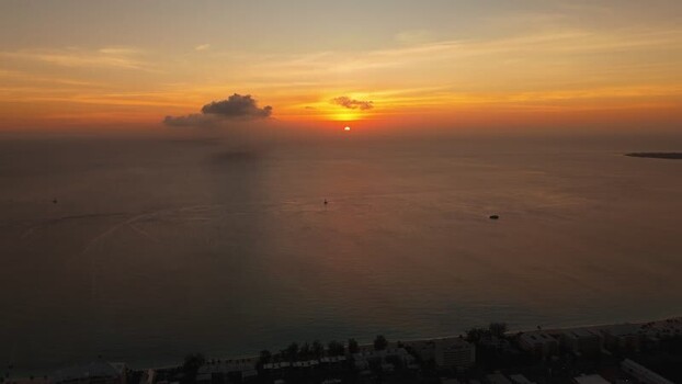 Aerial view of sunset over Grand Cayman Cayman Islands. Aerial view of sunset over Grand Cayman Cayman Islands.