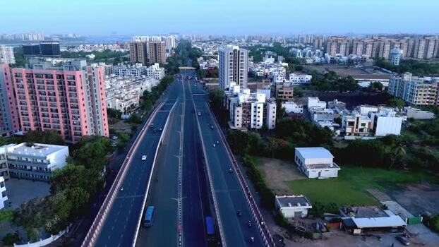Aerial view of highway and urban development in Surat India. Aerial view of highway and urban development in Surat India.