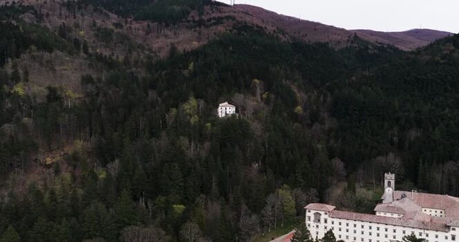 Aerial view of Vallombrosa Abbey surrounded by dense forest Italy. Aerial view of Vallombrosa Abbey surrounded by dense forest Italy.