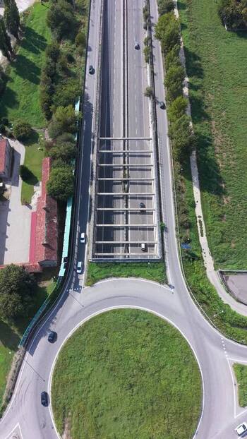 Aerial view of a provincial road and tunnel in Italy. Aerial view of a provincial road and tunnel in Italy.