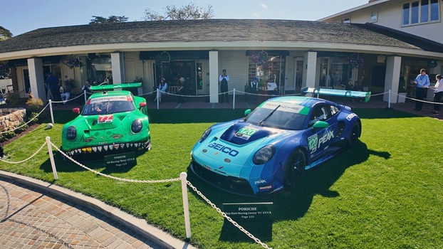 Del Monte Forest California United States 17 August 2025 View of AO Racing Porsche 911 GT3 R race cars on display at the Pebble Beach Concours d Elegance with Rexy and Roxy liveries. Del Monte Forest California United States 17 August 2025 View of AO Racing Porsche 911 GT3 R race cars on display at the Pebble Beach Concours d Elegance with Rexy and Roxy liveries.