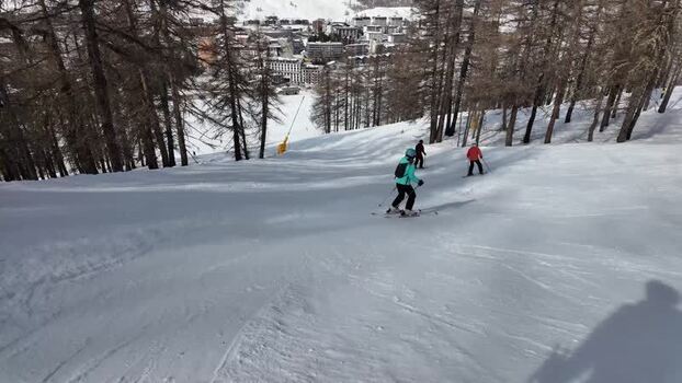 View of skiers on a slope near Sestriere village Italy. View of skiers on a slope near Sestriere village Italy.