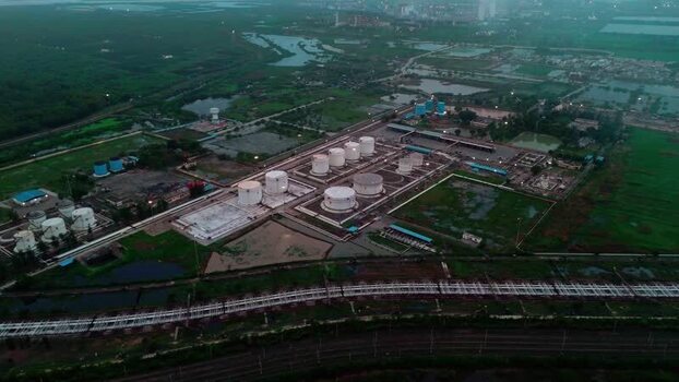 Aerial view of industrial storage tanks in Surat India. Aerial view of industrial storage tanks in Surat India.