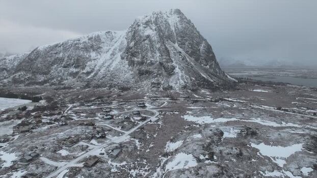 Aerial view of snowy Lofoten mountains in Vagan Municipality Norway.