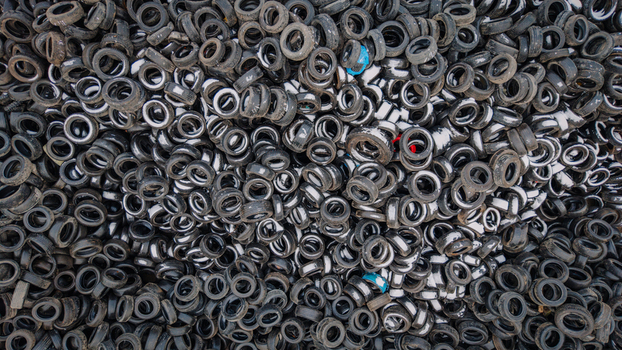 Aerial view of a massive pile of used car tires at a recycling facility highlighting environmental pollution and rubber recycling Valmiera Valmiera Latvija.