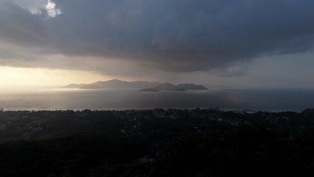 Aerial view of Anse Reunion coastline at sunset Seychelles.