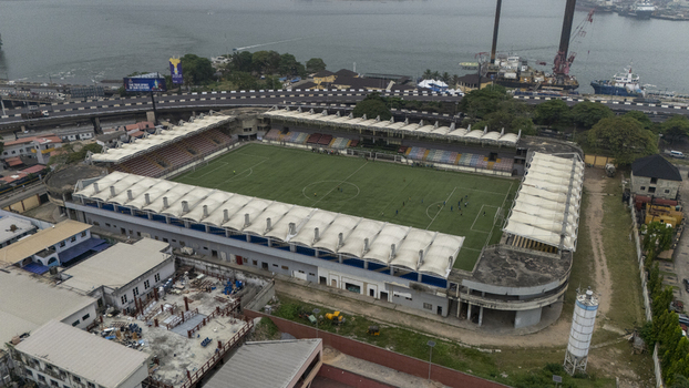 Aerial view of the Mobolaji Johnson Arena stadium with its green soccer pitch and spectator seating on Lagos Island Lagos Lagos Nigeria. Aerial view of the Mobolaji Johnson Arena stadium with its green soccer pitch and spectator seating on Lagos Island Lagos Lagos Nigeria.