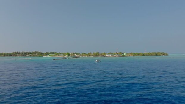 Aerial view of Vashafaru Island harbor Maldives.