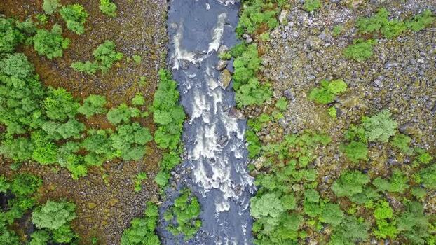 Aerial view of a river flowing through Hardangervidda Norway. Aerial view of a river flowing through Hardangervidda Norway.