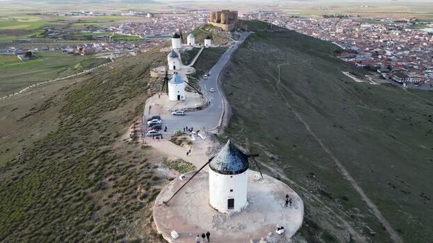 Aerial view of the historic windmills and castle in Consuegra Spain.