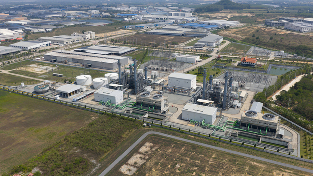 Aerial view of the Amata B.Grimm Power Rayong 3 Ltd. industrial complex featuring cooling towers and electrical infrastructure Tambon Mapyangphon Chang Wat Rayong Thailand. Aerial view of the Amata B.Grimm Power Rayong 3 Ltd. industrial complex featuring cooling towers and electrical infrastructure Tambon Mapyangphon Chang Wat Rayong Thailand.