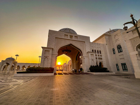 Abu Dhabi United Arab Emirates 14 October 2023 View of Qasr Al Watan Presidential Palace at sunset with golden light illuminating the intricate white stone architecture. Abu Dhabi United Arab Emirates 14 October 2023 View of Qasr Al Watan Presidential Palace at sunset with golden light illuminating the intricate white stone architecture.